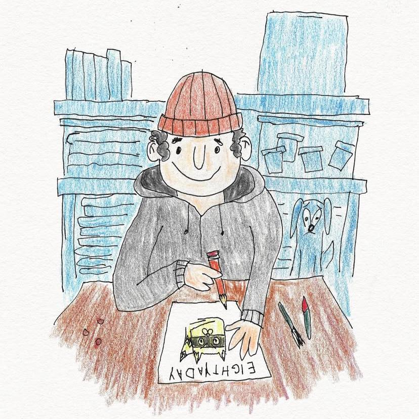 Illustration of a man with a toque and zip-up hoodie drawing a raccoon with the name eightyaday